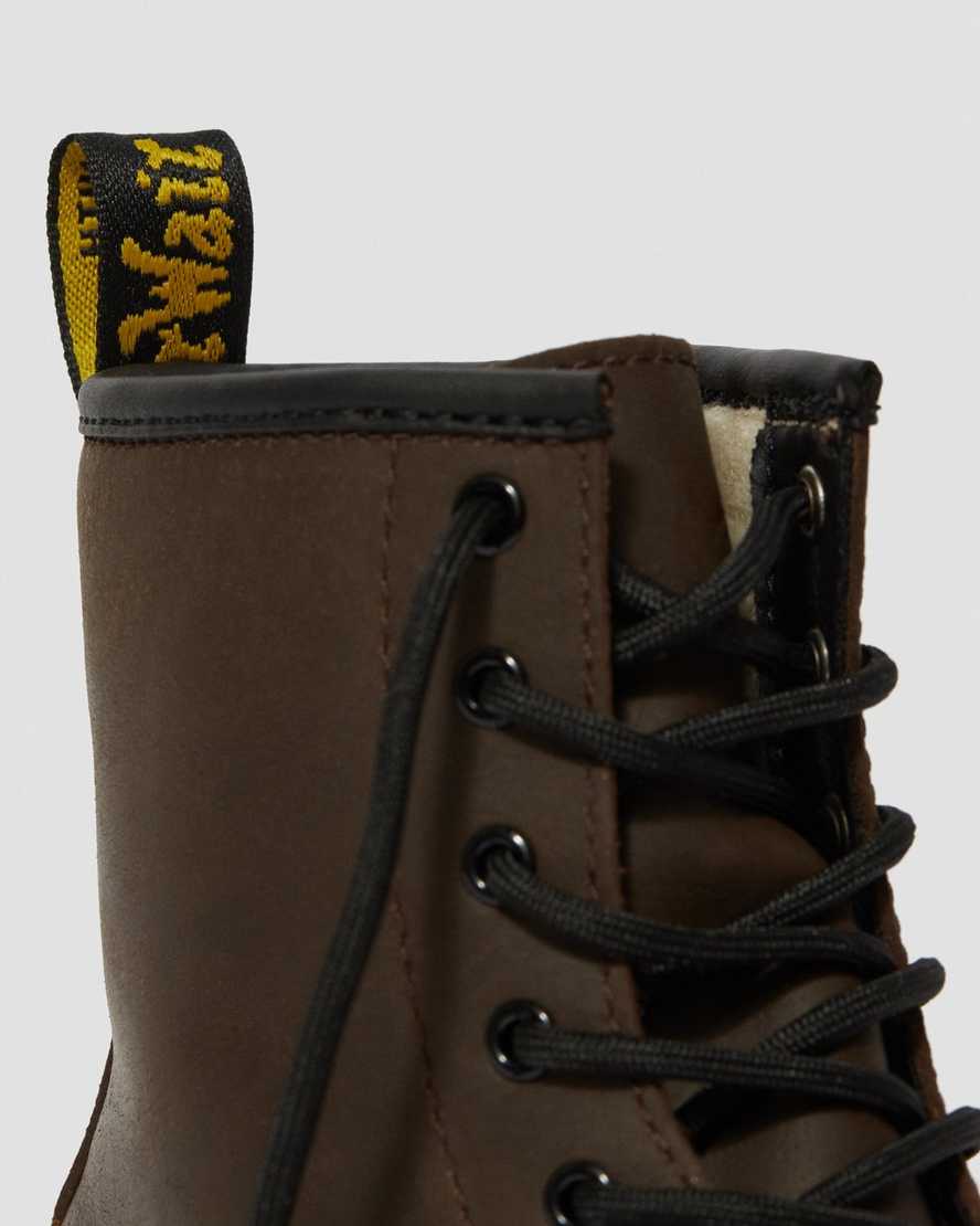 dunkelbraune dr. martens 1460 schnürstiefel für kinder mit kunstfellfutter