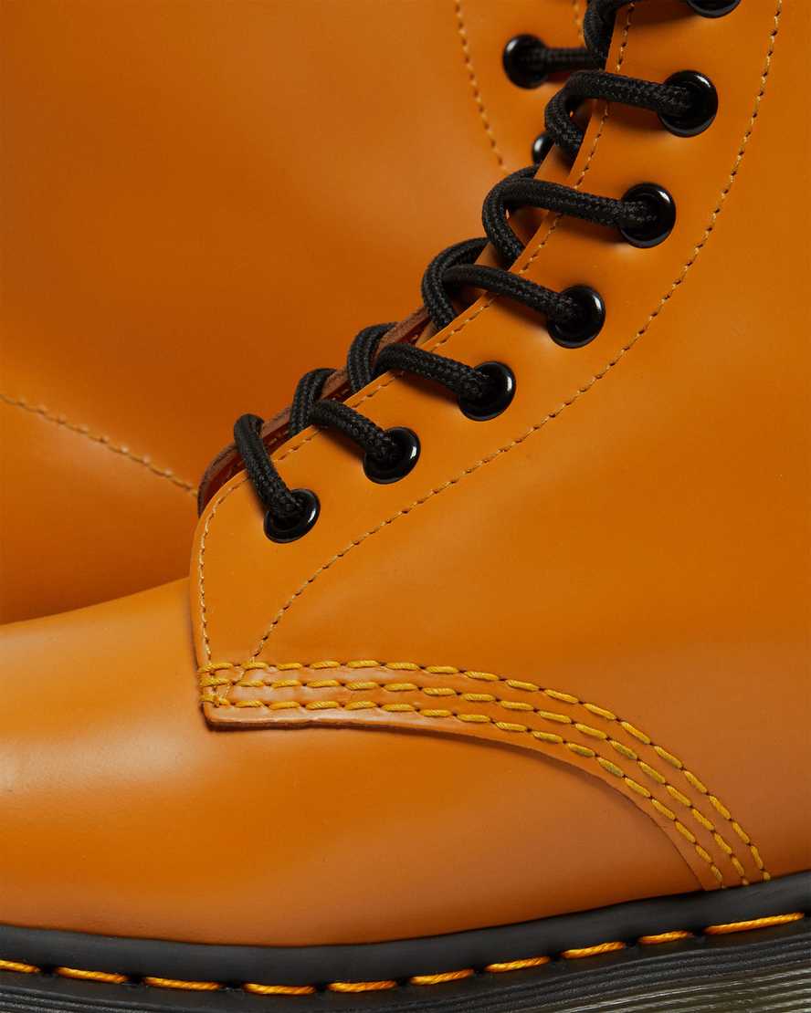orangefarbene dr. martens 1460 smooth herren-schnürstiefel