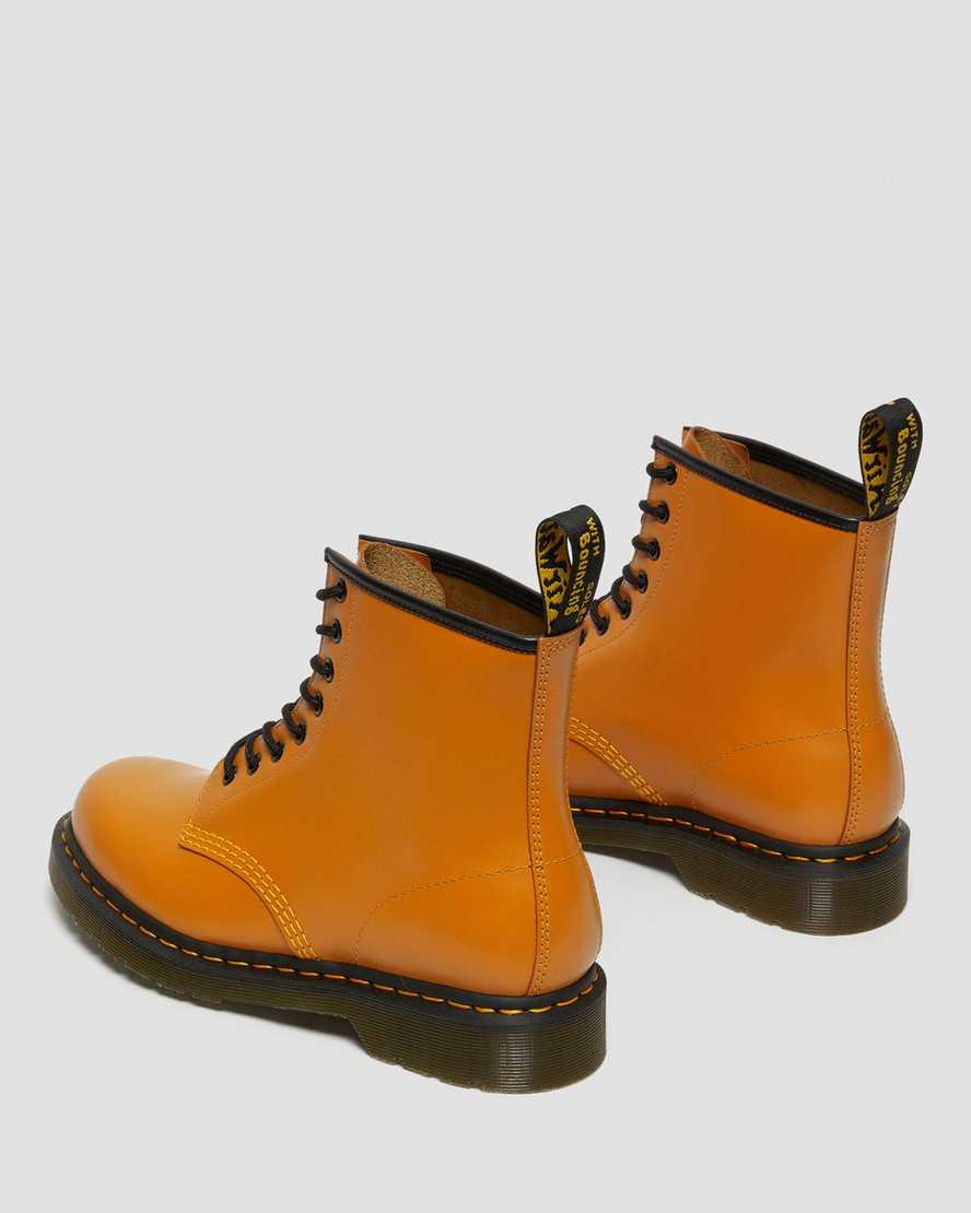 orangefarbene dr. martens 1460 smooth herren-schnürstiefel