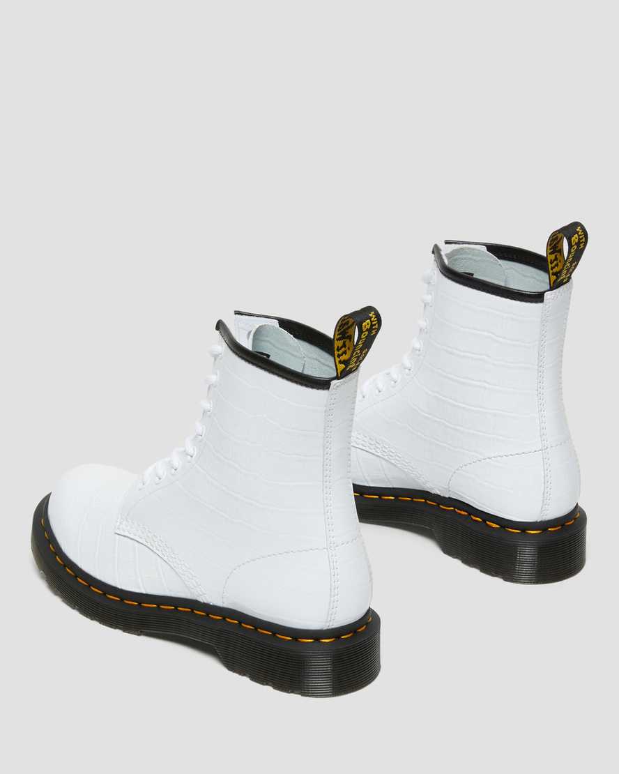 weiße dr. martens 1460 lackleder-freizeitstiefel mit krokodilprägung für damen