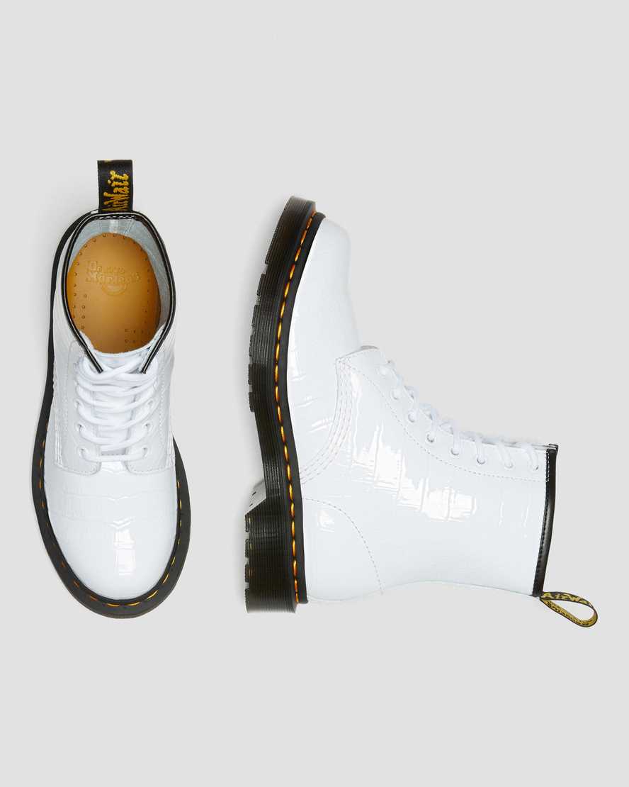 weiße dr. martens 1460 lackleder-freizeitstiefel mit krokodilprägung für damen