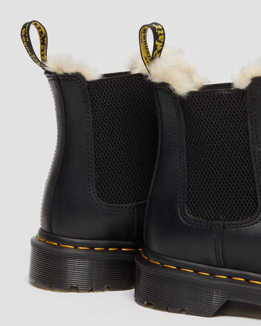 schwarze dr. martens 2976 chelsea boots für damen mit kunstfellfutter