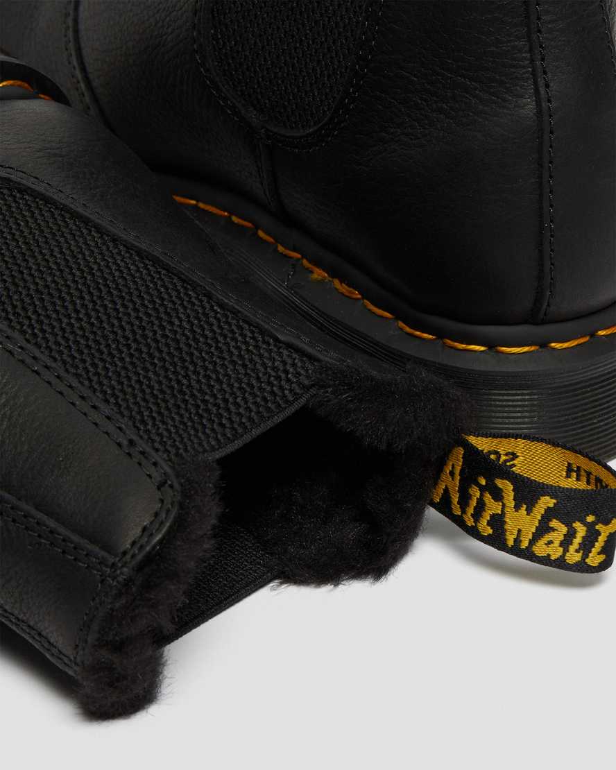 schwarze dr. martens 2976 chelsea boots für damen mit kunstfellfutter