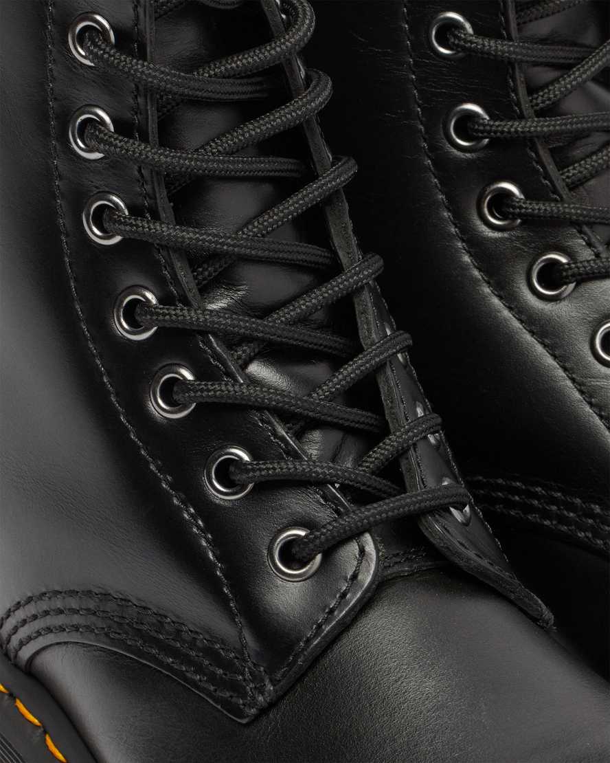 schwarze dr. martens 1460 serena schnürstiefel für damen mit kunstfellfutter.