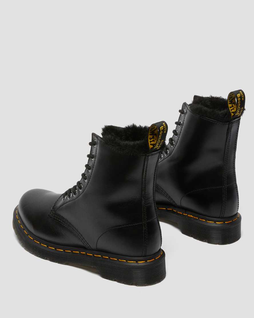 schwarze dr. martens 1460 serena schnürstiefel für damen mit kunstfellfutter.