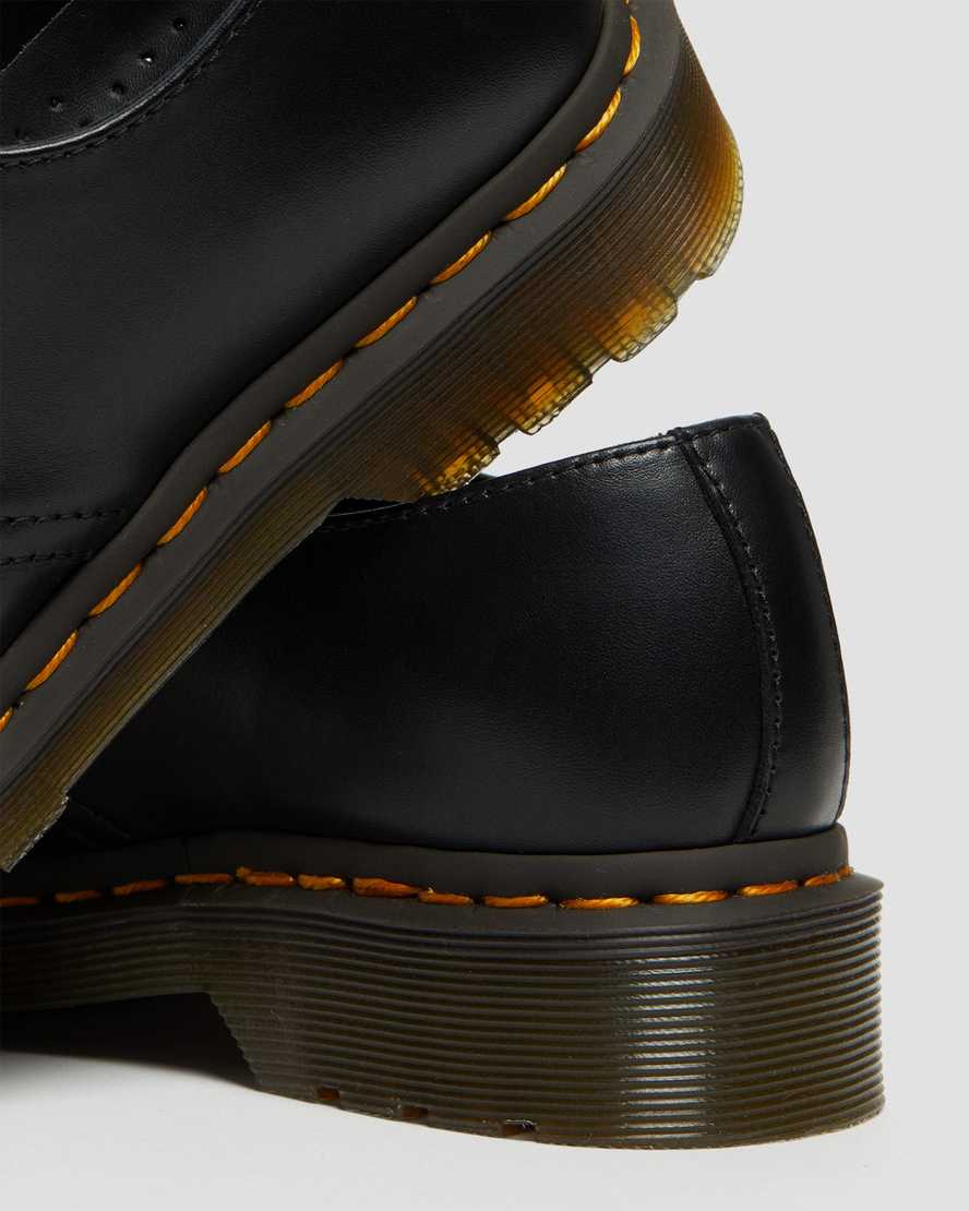 schwarze dr. martens 1461 damen-freizeitschuhe mit roségoldenen beschlägen