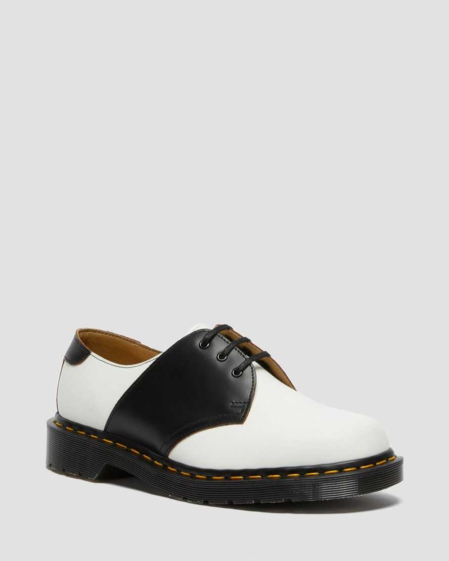 weiße und schwarze dr. martens 1461 damen-sattelschuhe