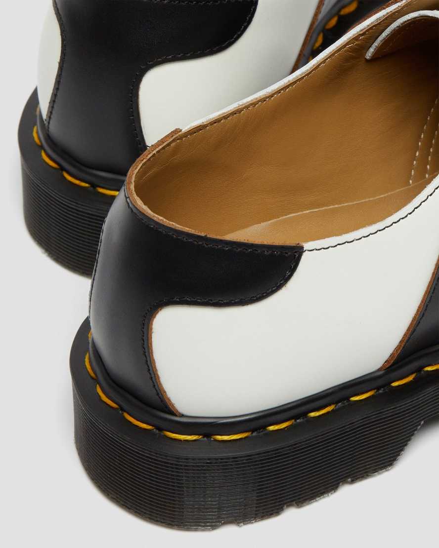 weiße und schwarze dr. martens 1461 damen-sattelschuhe