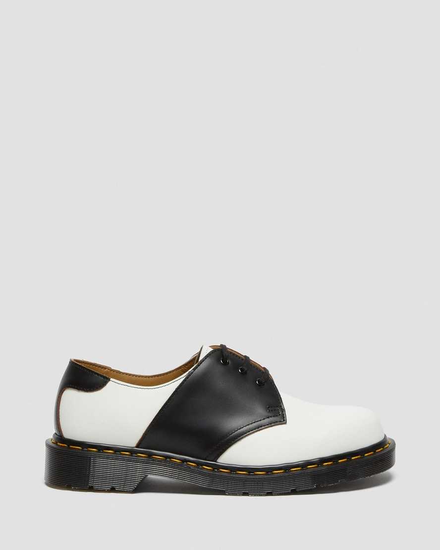 weiße und schwarze dr. martens 1461 damen-sattelschuhe