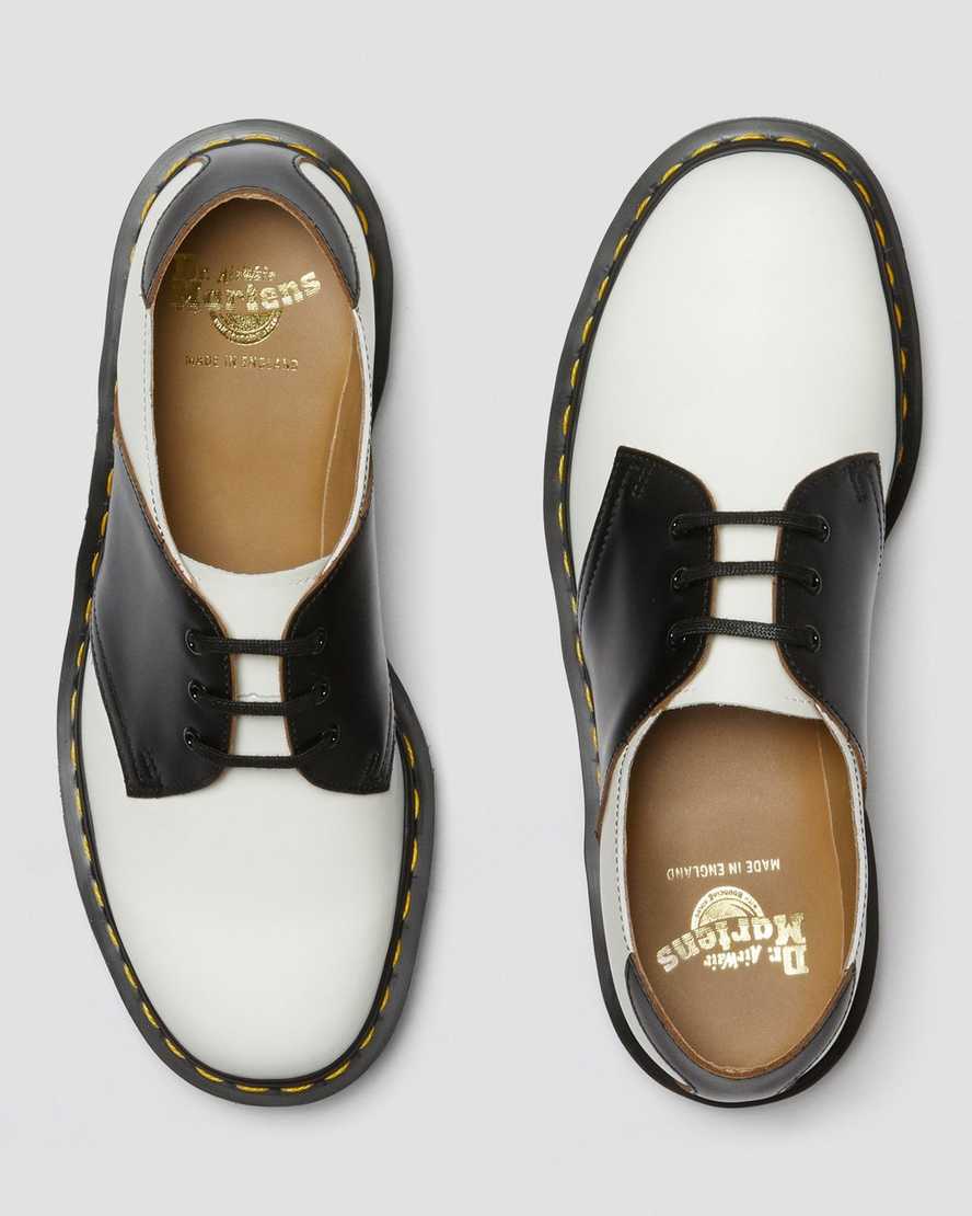 weiße und schwarze dr. martens 1461 damen-sattelschuhe